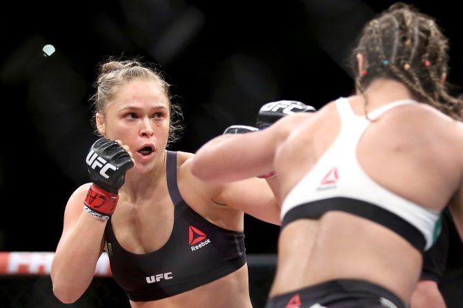 UFC fighter Ronda Rousey (left) has endorsed Bernie Sanders. "I'm voting for Bernie Sanders, because he doesn't take any corporate money," Rousey told Maxim. As for Trump? "I wouldn't vote for him," she told CNN. "I don't want a reality TV star to be running my country."