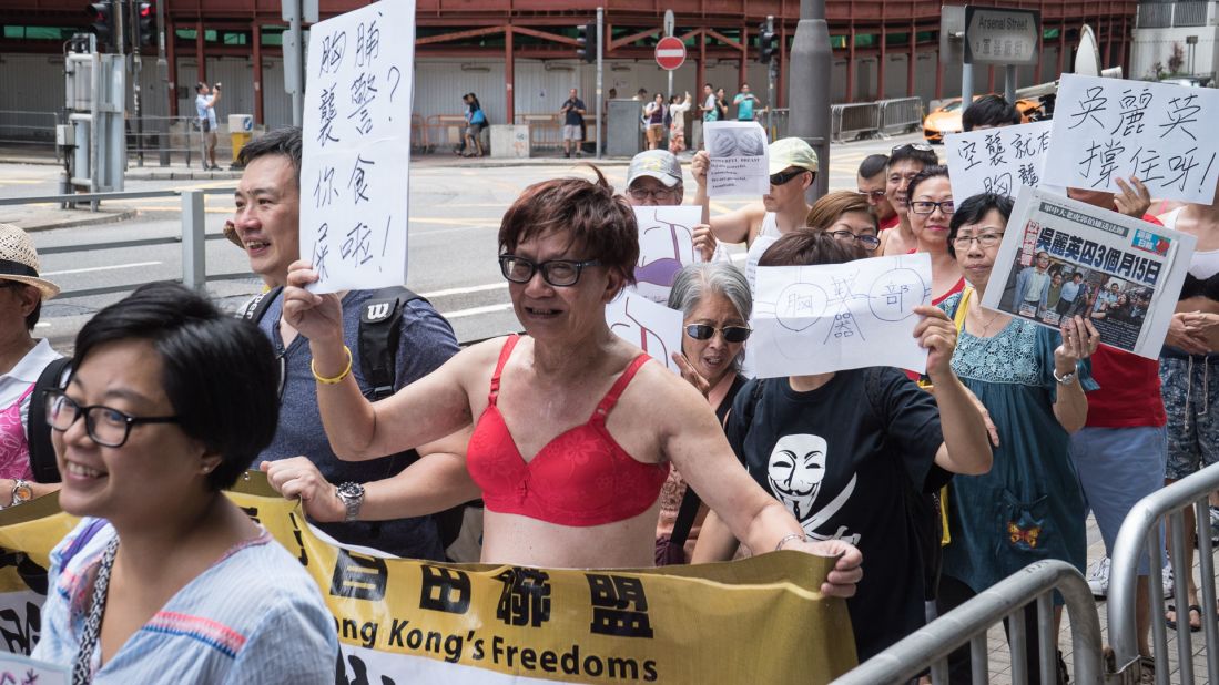 Protesters rallied in support of Ng Lai-ying, the woman sentenced to prison after her chest bumped the right arm of a policeman during a demonstration earlier in March.