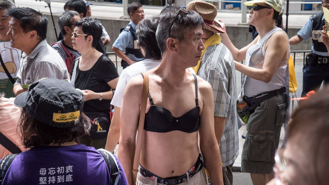 Men wear bras in Hong Kong to protest woman's 'breast assault