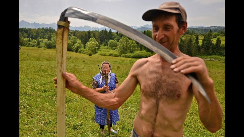 "Traditional haymaking in Poland," Jurecki said. "Many people continue to use the scythe and pitchfork to sort the hay."