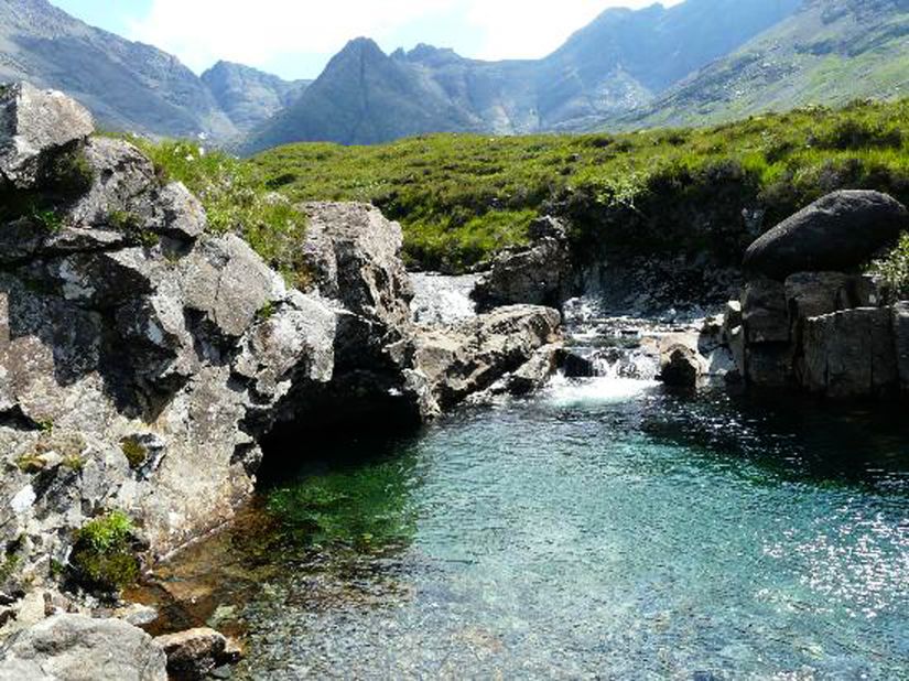Located at Glen Brittle in Scotland, Fairy Pools is a series of aquamarine pools fed by scenic -- and icy cold -- waterfalls streaming down from the Cuillin mountains.