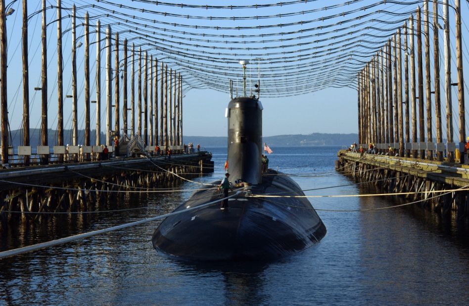 The Seawolf-class attack submarine USS Jimmy Carter is moored in a Washington state facility that reduces a ship's electromagnetic signature in 2006. The Jimmy Carter is 100 feet longer than the first two subs in its class. The extra space is for a "multimission platform," the Navy says. "This hull section provides for additional payloads to accommodate advanced technology used to carry out classified research and development and for enhanced warfighting capabilities."