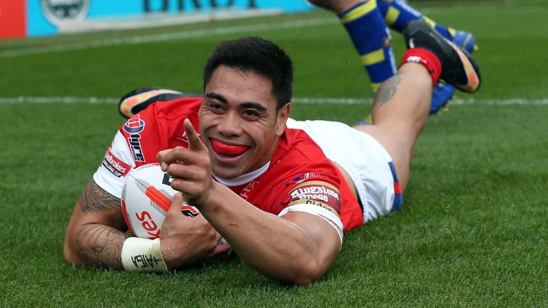 Rugby player Ken Sio scores a try during the Challenge Cup semifinals in Leeds, England, on Saturday, August 1. Sio's club, Hull Kingston Rovers, advanced to the final with a 26-18 victory over the Warrington Wolves.