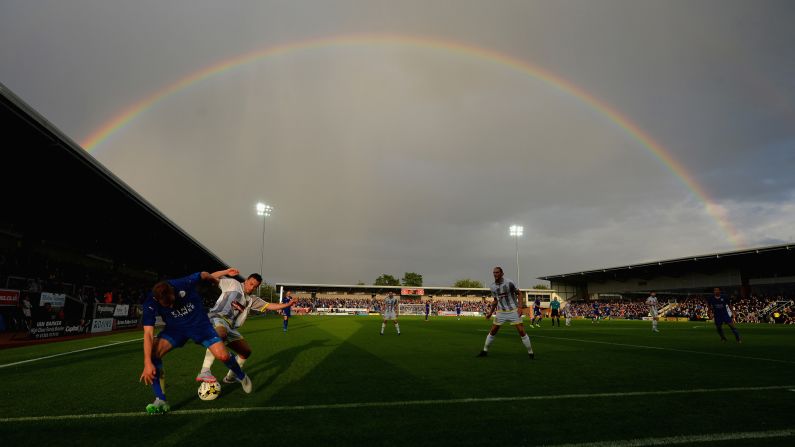 A rainbow appears over the Pirelli Stadium in Burton upon Trent, England, during a preseason soccer match between Burton Albion and Leicester City on Tuesday, July 28.