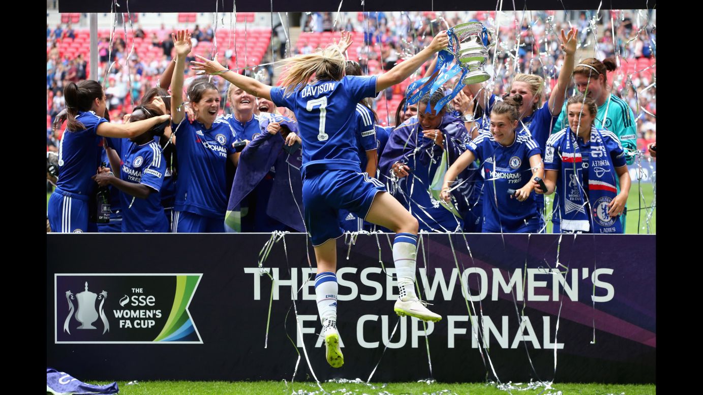 Soccer player Gemma Davison celebrates with her Chelsea teammates after they won the Women's FA Cup final Saturday, August 1, in London. Chelsea defeated Notts County 1-0.