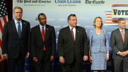 (L-R) Former Florida Gov. Jeb Bush, Dr. Ben Carson, New Jersey Gov. Chris Christie, former CEO Hewlett-Packard Carly Fiorina, U.S. Senator Lindsey Graham (SC), Louisiana Gov. Bobby Jindal, Ohio Gov. John Kasich, former New York Gov. George Pataki, former Texas Gov. Rick Perry, former U.S. Senator Rick Santorum (PA), Wisconsin Gov. Scott Walker stand on the stage prior to the Voters First Presidential Forum for Republicans at Saint Anselm College August 3, 2015 in Manchester, New Hampshire. The forum was organized by the New Hampshire Union Leader and C-SPAN in response to the Fox News debate later this week that will limit the candidates to the top 10 Republicans based on nationwide polls. (Photo by Darren McCollester/Getty Images)