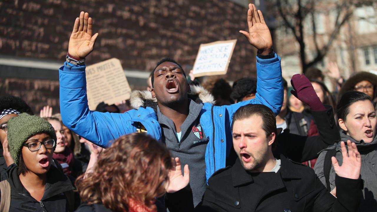 People at Washington University in St. Louis protest last December to draw attention to police abuse.