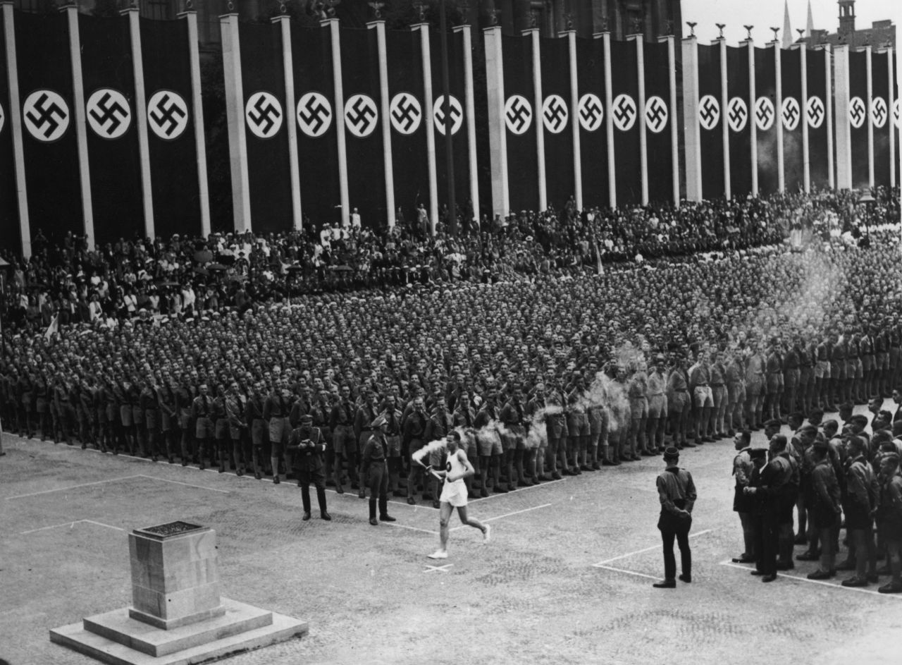 These Games will forever be associated with Adolf Hitler and his brutal regime. Germany's Fuhrer viewed it as an ideal opportunity<a href="https://www.cnn.com/2015/07/31/sport/germany-berlin-jewish-olympics-maccabi/index.html" target="_blank"> to show the supremacy of the Aryan race</a>, but American Jesse Owens flew in the face of such prejudices by winning four gold medals -- three in sprint events and one in the long jump. The first torch relay was held, with the flame carried from Mount Olympus to the Olympic Stadium.