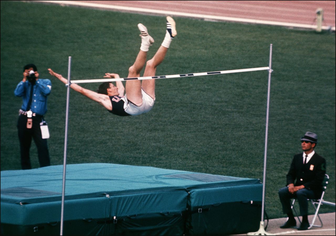 American Dick Fosbury changed the high jump forever by claiming the gold medal with his revolutionary "Fosbury Flop" technique. It has since become the dominant technique in the event.
