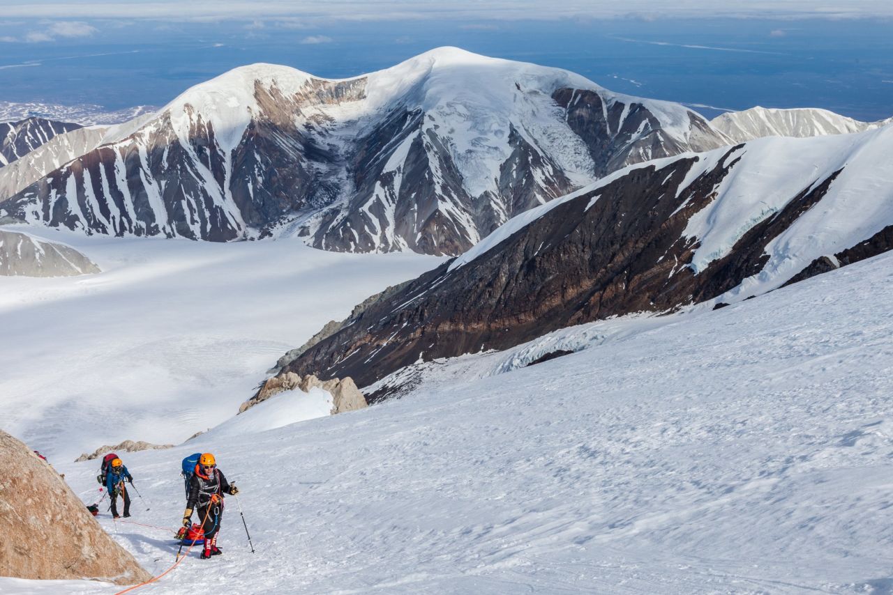 There's no such thing as "light and fast" on Denali. With the food, fuel and cold-weather clothing required for a three-week expedition, packs can weigh 60-80 pounds. Until much of the food and fuel is spent on lower elevations, climbers use sleds to haul gear up the mountain.  