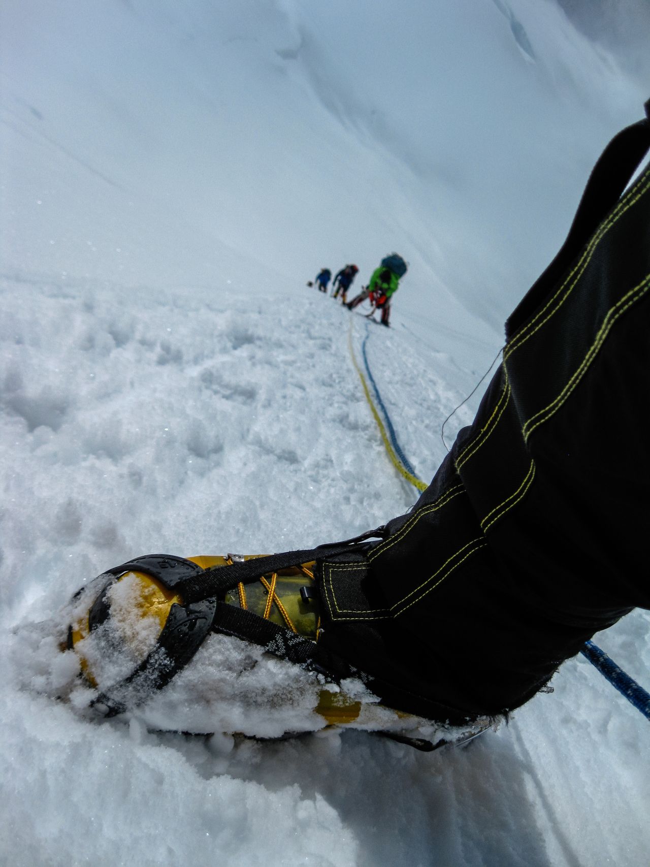 After leaving the advanced base camp, climbers clip themselves into a section of ropes attached to the snow and ice. These ropes, called fixed lines, allow climbers to safely ascend the steep and icy slope between 15,000 and 16,000 feet.