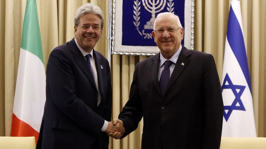 Israeli President Reuven Rivlin (R) greets Italian Foreign Affairs minister Paolo Gentiloni at the presidential compound in Jerusalem on June 30, 2015. AFP PHOTO / GALI TIBBONGALI TIBBON/AFP/Getty Images