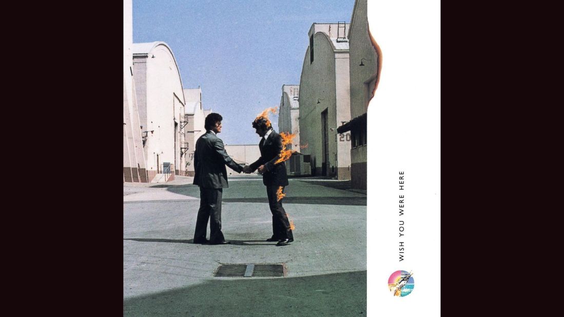 <strong>"Wish You Were Here," Pink Floyd</strong>: No gallery of album covers would be complete without at least one representative from the design team of Hipgnosis, known for its surreal photographic imagery. Hipgnosis' works include Led Zeppelin's "Houses of the Holy," 10cc's "Deceptive Bends" and Peter Gabriel's first three solo albums. "Here," Pink Floyd's 1975 record, is particularly arresting: two men shaking hands, one of whom is on fire, with the flames licking the frame of the photograph.