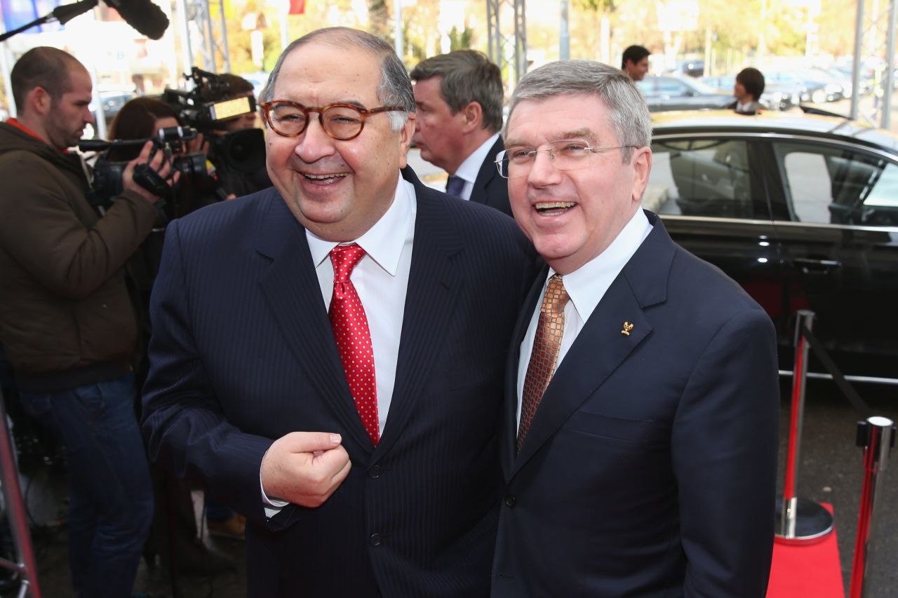Usmanov, the fencing champion of Uzbekistan three times in his youth and current head of the International Fencing Federation, is pictured alongside IOC President Thomas Bach, who won Olympic gold in fencing in 1976. 