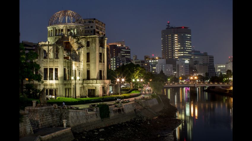 People are seen visiting the Atomic Bomb Dome at the Hiroshima Peace Memorial Park on August 5, 2015 in Hiroshima, Japan.