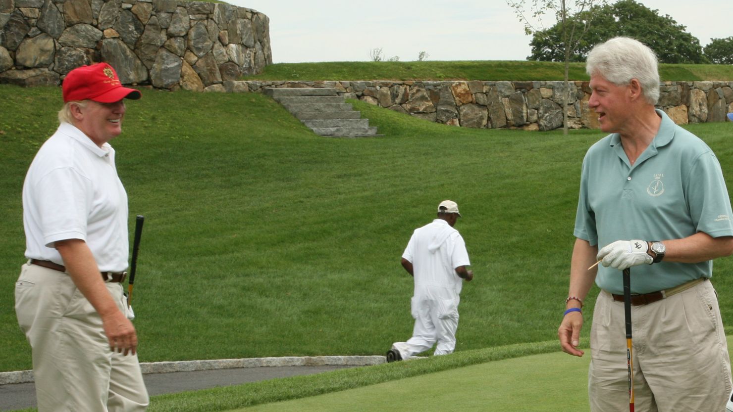 Donald Trump and Bill Clinton are pictured at the Trump National Golf Club on July 14, 2008, in Briarcliff Manor, New York. 
