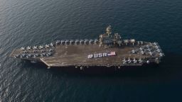 150628-N-VC236-071ARABIAN GULF (June 28, 2015) - Sailors spell out #USA with the American flag on the flight deck of the aircraft carrier USS Theodore Roosevelt in honor of the nation's upcoming Independence Day weekend. Theodore Roosevelt is deployed to the U.S. 5th Fleet area of operations as part of Theodore Roosevelt Carrier Strike Group supporting Operation Inherent Resolve, strike operations in Iraq and Syria as directed, maritime security operations and theater security cooperation efforts in the region. (U.S. Navy photo by Mass Communication Specialist 3rd Class Jackie Hart/Released)