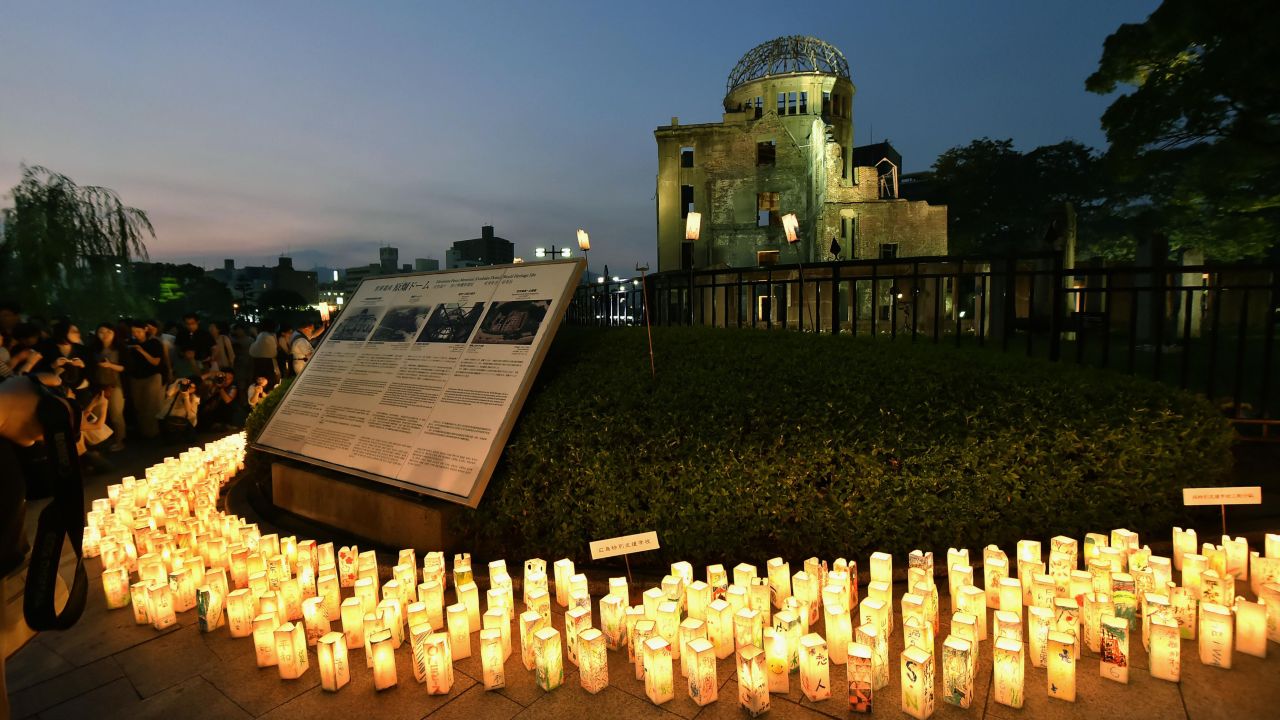 Candles are lit around the Hiroshima Peace Memorial in Hiroshima, Japan, on Thursday, August 6.  