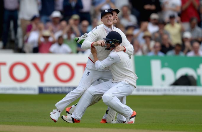 Sixth out: Ben Stokes of England celebrates with Jonathan Bairstow and Jos Buttler after catching out Adam Voges of Australia.