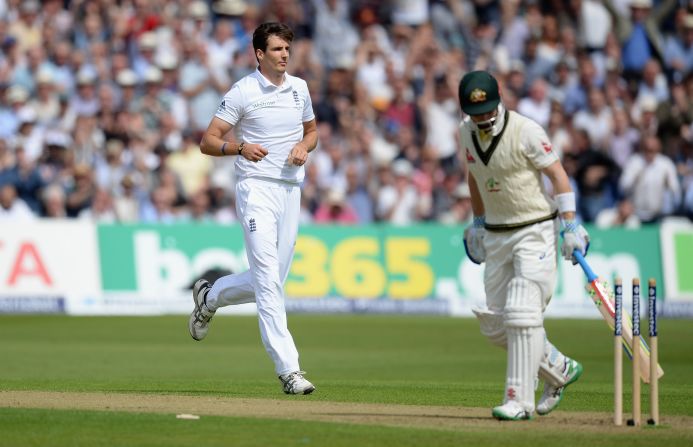 Seventh out: Steven Finn of England celebrates taking Peter Nevill's wicket.
