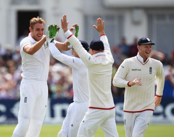 Eighth out: Broad celebrates the wicket of Mitchell Johnson of Australia.