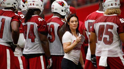 GLENDALE, AZ - AUGUST 02:  Intern linebacker coach Jen Welter of the Arizona Cardinals works with the defense during the team training camp at University of Phoenix Stadium on August 2, 2015 in Glendale, Arizona.  (Photo by Christian Petersen/Getty Images)