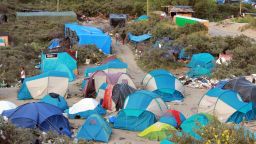 The camp sprawls over about 40 acres of sand dunes once used for landfill, with different nationalities in different sections.