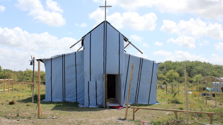 The Eritrean/Ethiopian Christian Orthodox church in the camp. It's made from materials donated by local people including new local churches. Around 100 people pray here every day according to the pastor, who is a migrant himself.
