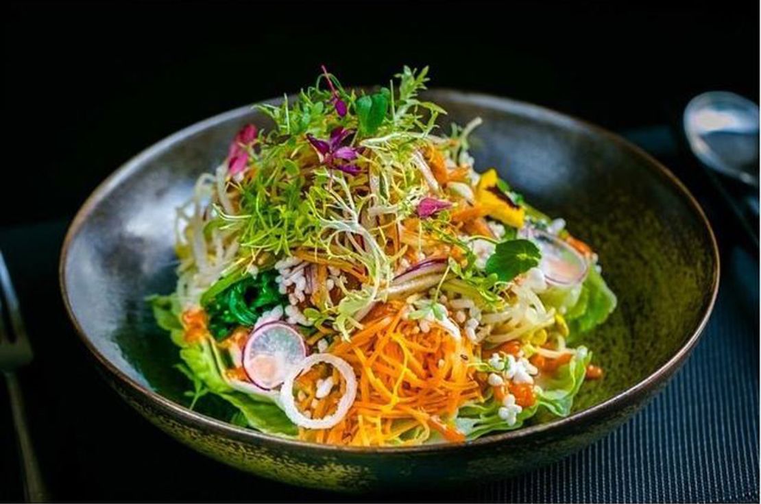 Although Kwon specializes in French, his Moscow restaurant serves Korean food. Pictured is a bibimbap with crispy fried rice, fried chicken, bean sprouts and spinach.