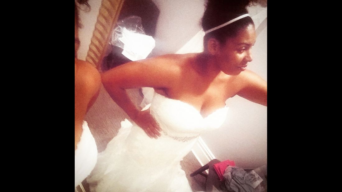 Collins faced her fears and took this picture while trying on wedding dresses this summer.