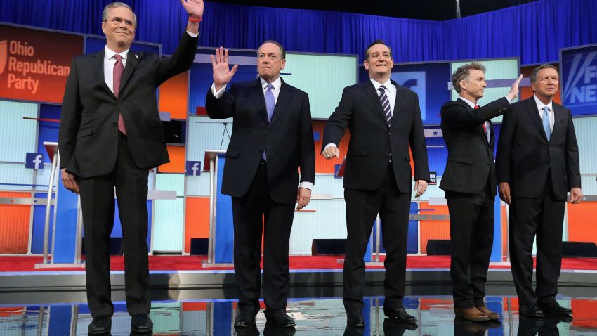 Republican presidential candidates (L-R) Jeb Bush, Mike Huckabee, Sen. Ted Cruz (R-TX), Sen. Rand Paul (R-KY) and John Kasich take the stage for the first prime-time presidential debate hosted by FOX News and Facebook at the Quicken Loans Arena August 6, 2015 in Cleveland, Ohio.