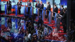 Audience members are reflected in a window as Republican presidential candidates (L-R) New Jersey Gov. Chris Christie, Sen. Marco Rubio (R-FL), Ben Carson, Wisconsin Gov. Scott Walker, Donald Trump, Jeb Bush, Mike Huckabee, Sen. Ted Cruz (R-TX), Sen. Rand Paul (R-KY) and John Kasich participate in the first prime-time presidential debate hosted by FOX News and Facebook at the Quicken Loans Arena August 6, 2015 in Cleveland, Ohio.