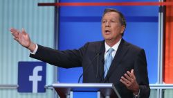 CLEVELAND, OH - AUGUST 06:  Republican presidential candidate Ohio Gov. John Kasich fields a question during the first Republican presidential debate hosted by Fox News and Facebook at the Quicken Loans Arena on August 6, 2015 in Cleveland, Ohio. The top ten GOP candidates were selected to participate in the debate based on their rank in an average of the five most recent political polls.  (Photo by Scott Olson/Getty Images)