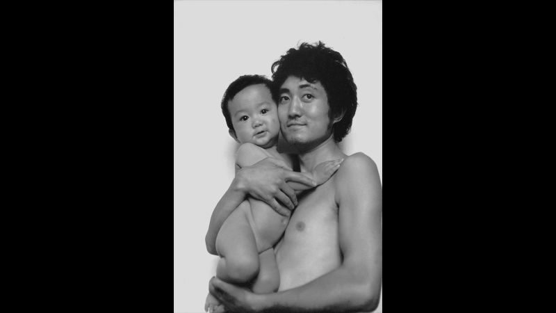 Father and son pose for the same photo for 3 decades photo picture