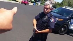 Cop confrontation goes viral pulls gun orig_00000000.jpg