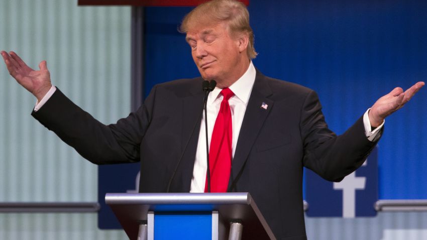 Republican presidential candidate Donald Trump gestures during the first Republican presidential debate at the Quicken Loans Arena Thursday, Aug. 6, 2015, in Cleveland. (AP Photo/John Minchillo)