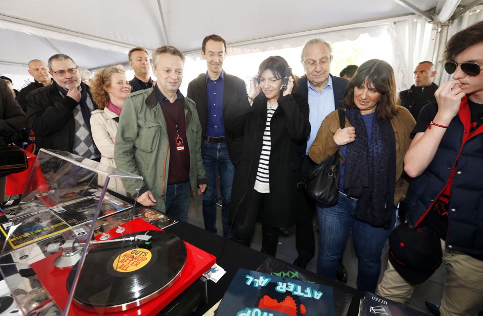 Global vinyl sales rose 54% in 2014, partly driven by the introduction of "Record store day" around the world. The Mayor of Paris Anne Hidalgo attended her city's event in 2015.