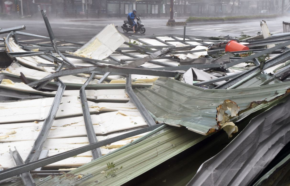 Metal sheeting lies on a Taipei road after the arrival of Typhoon Soudelor early on August 8. 