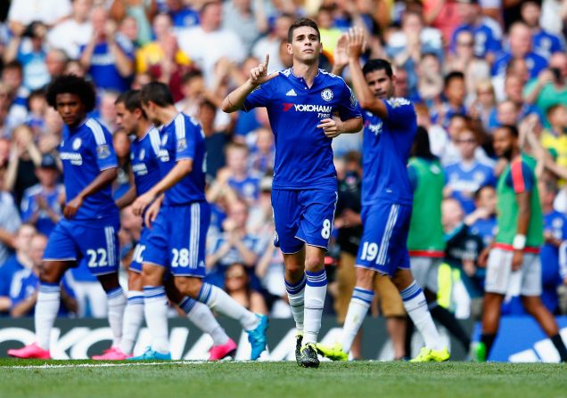 Oscar of Chelsea celebrates scoring his team's first goal during the Premier League match between Chelsea and Swansea City at Stamford Bridge in the first day of the 2015-2016 campaign. 