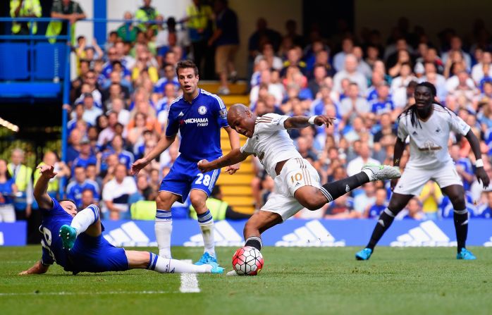 Ghanian  Andre Ayew of Swansea City draws the match at 1-1, rocketing the ball past defender John Terry of Chelsea.
