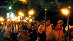 Catholics hold bamboo torches during a peace march from the Urakami Cathedral toward the Peace Memorial park in Nagasaki, Japan on August 9. Japan  marked the 70th anniversary of the atomic bombing of Nagasaki that claimed more than 70,000 lives in one of the final chapters of World War II.