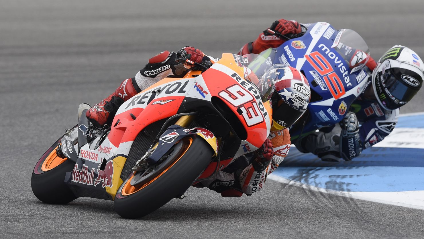 Reigning world champion Marc Marquez takes the lead from compatriot Jorge Lorenzo