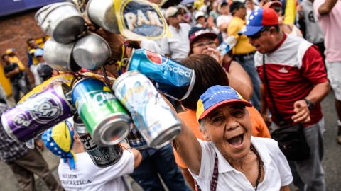 Venezuela's opposition activists rally against crime and shortages in the country, in Caracas, August 8.