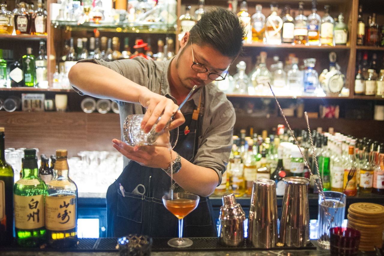 David Hong, head bartender at Tailor, prepares a "Bamboo/Rob Roy hybrid." There is no cocktail menu. Each drink is tailored to the customer.
