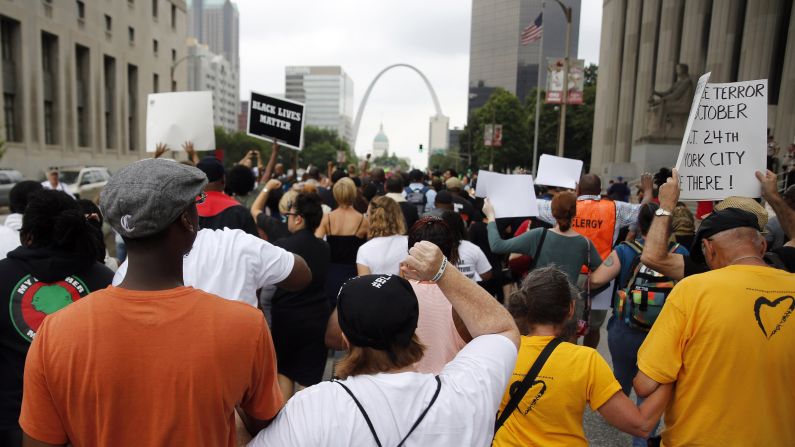 Protesters march to the Federal Courthouse on August 10 in St. Louis. 