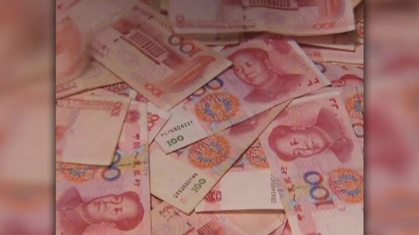 china devalues currency yuan lok jiang_00002503.jpg