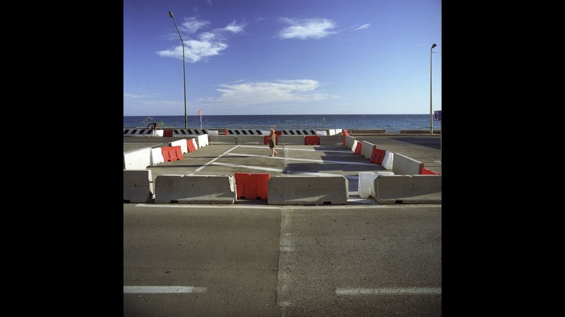 Here the border between the two countries is indicated by a change in road surface -- the result of each country using different maintenance companies (Italy on the left, France on the right). 