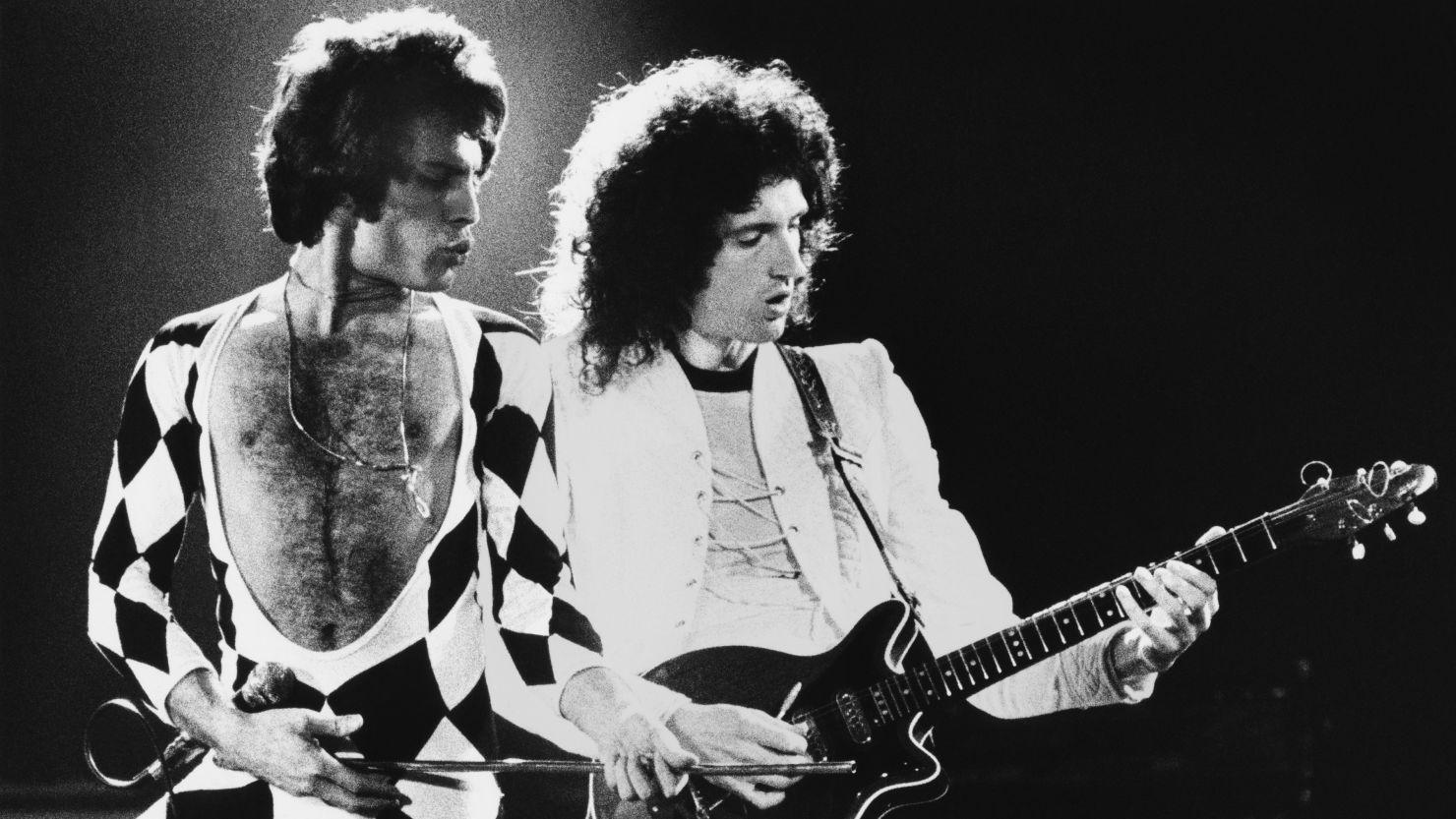 Singer Freddie Mercury and guitarist Brian May of the rock group Queen perform during a 1978 concert.