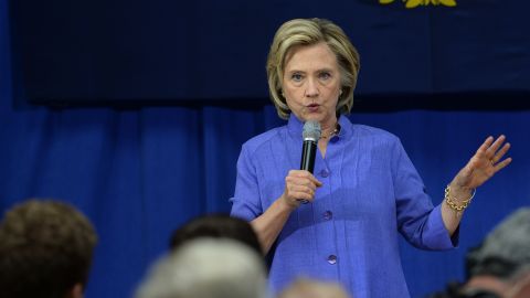 Two Hillary Clinton aides said they won't destroy their old emails, and Clinton handed over her private server to the Justice Department on Wednesday.