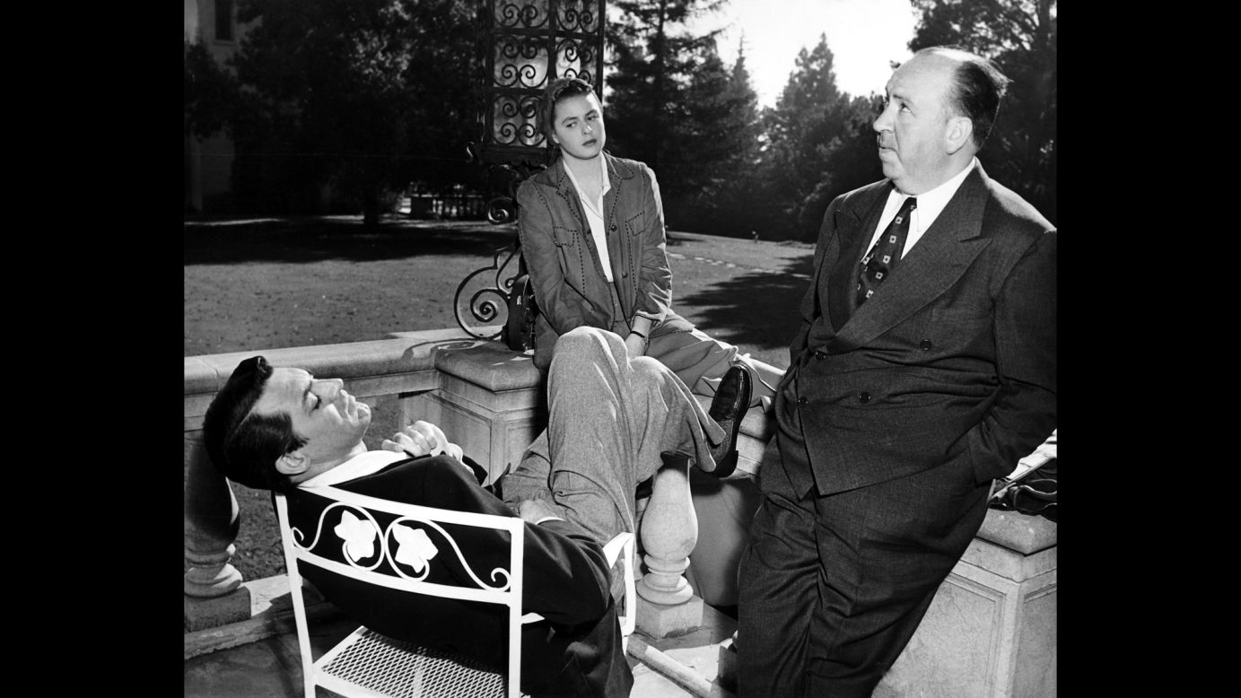 Hitchcock speaks with Cary Grant and Ingrid Bergman on the set of 1946's "Notorious," one of six of his films to be preserved in the National Film Registry.
